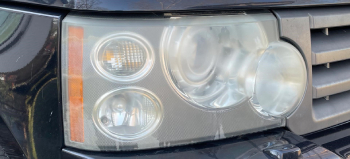 Land Rover before headlight restoration
